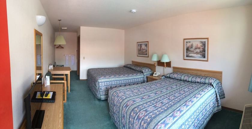 Imagen de la habitación del Hotel Mini Golden Inns Motel. Foto 12