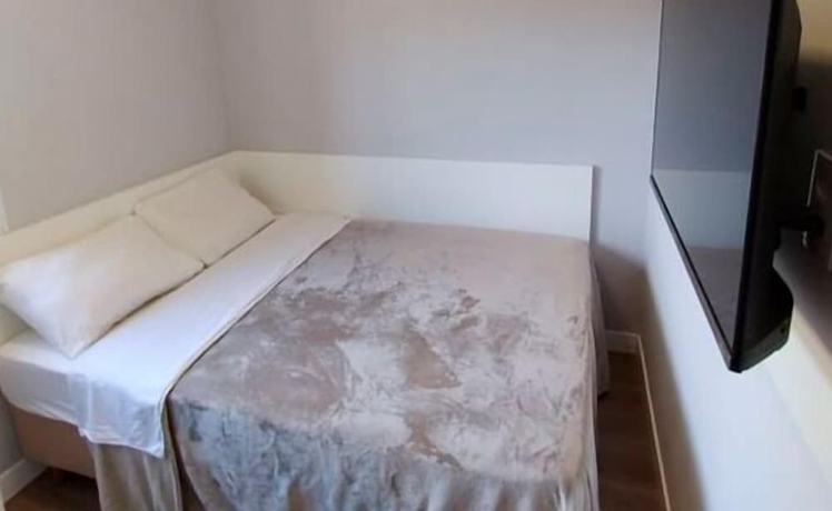 Imagen de la habitación del Hotel Mini House Lago Santa. Foto 2