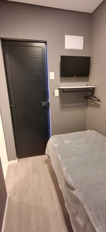 Imagen de la habitación del Hotel Mini House Lago Santa. Foto 7