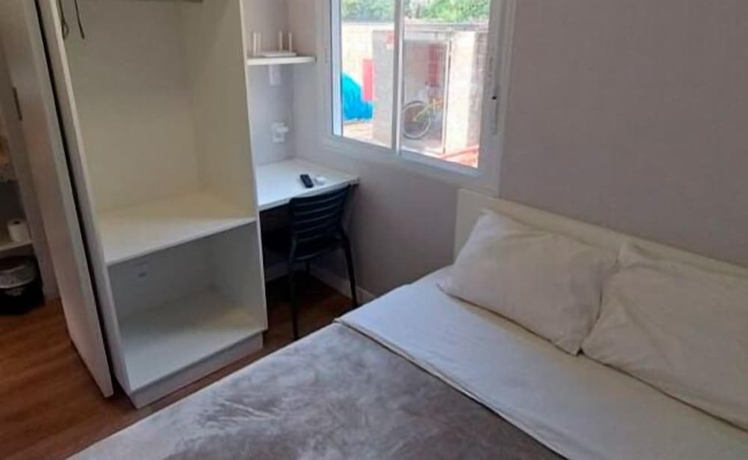 Imagen de la habitación del Hotel Mini House Lago Santa. Foto 16