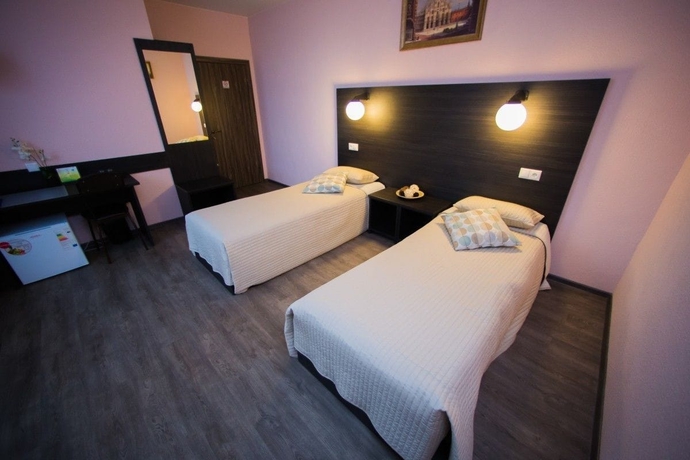 Imagen de la habitación del Hotel Mini Kosmos. Foto 6