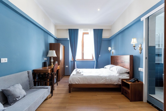 Imagen de la habitación del Hotel Mini, Livorno. Foto 4