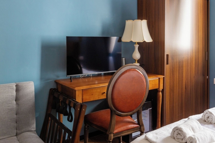 Imagen de la habitación del Hotel Mini, Livorno. Foto 7