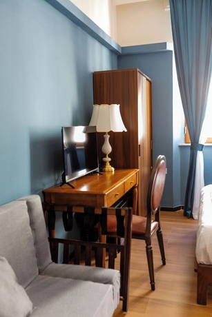 Imagen de la habitación del Hotel Mini, Livorno. Foto 9