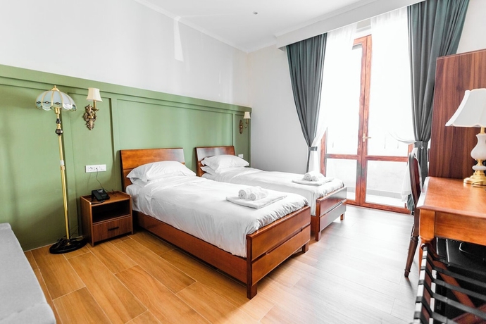 Imagen de la habitación del Hotel Mini, Livorno. Foto 11