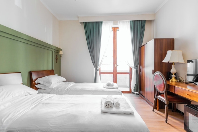Imagen de la habitación del Hotel Mini, Livorno. Foto 12