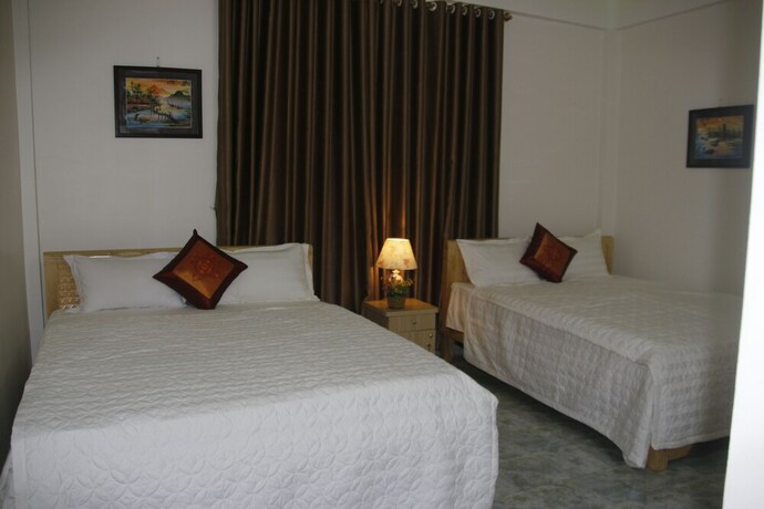 Imagen de la habitación del Hotel Mini Mansion. Foto 18