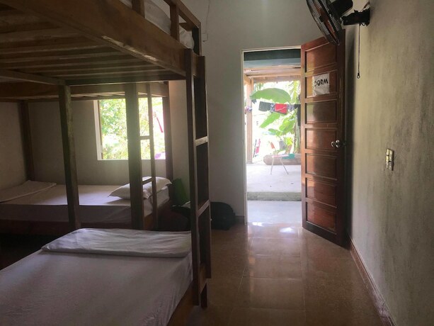 Imagen de la habitación del Hotel Mini Mansion. Foto 26