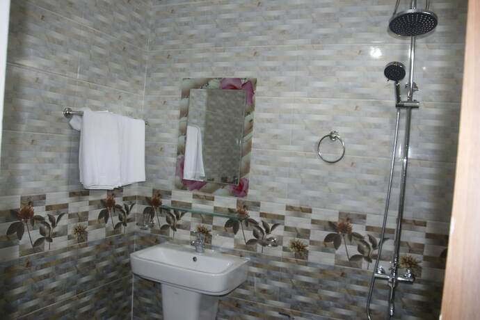 Imagen de la habitación del Hotel Mini Mansion. Foto 32