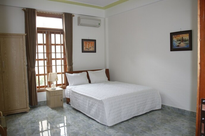 Imagen de la habitación del Hotel Mini Mansion. Foto 33