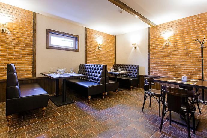 Imagen del bar/restaurante del Hotel Mini-Gastsinny yard \