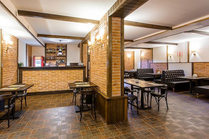 Imagen del bar/restaurante del Hotel Mini-Gastsinny yard \