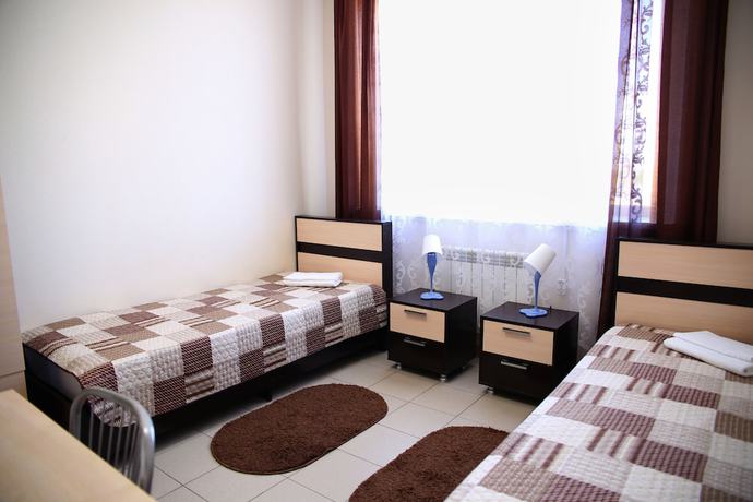 Imagen de la habitación del Hotel Mini-Koleso. Foto 11