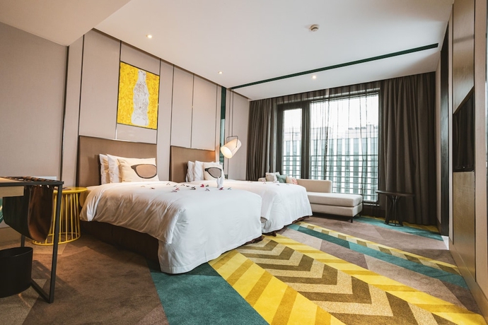Imagen de la habitación del Hotel MiniMax Premier Hotel Shanghai Hongqiao. Foto 2