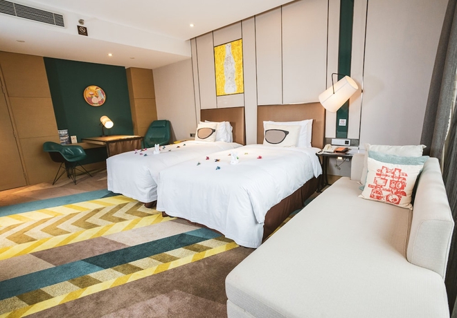 Imagen de la habitación del Hotel MiniMax Premier Hotel Shanghai Hongqiao. Foto 11