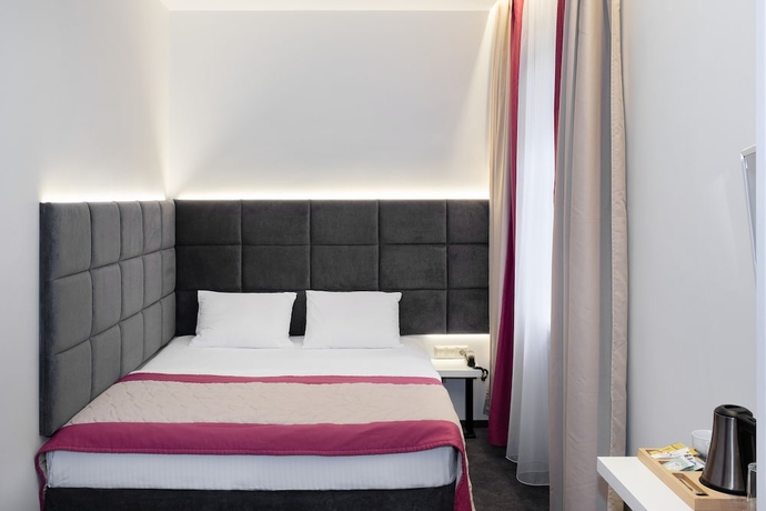 Imagen de la habitación del Hotel Minima Belorusskaya. Foto 8