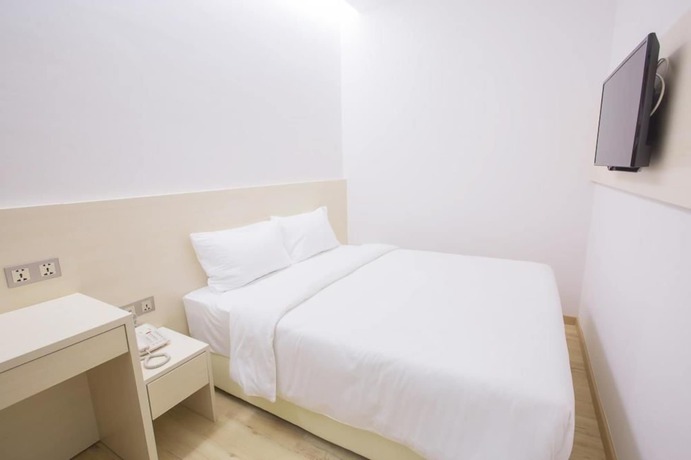 Imagen de la habitación del Hotel Minimalist. Foto 6