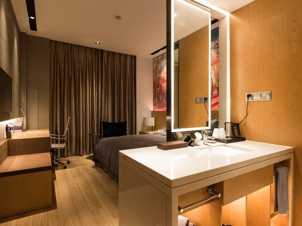 Imagen de la habitación del Hotel Minimax Shanghai Songjiang. Foto 12