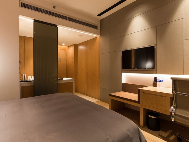 Imagen de la habitación del Hotel Minimax Shanghai Songjiang. Foto 13