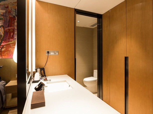 Imagen de la habitación del Hotel Minimax Shanghai Songjiang. Foto 15