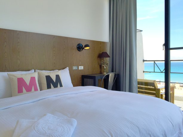 Imagen de la habitación del Hotel Minimi Inn - Sailrock Beach House. Foto 2