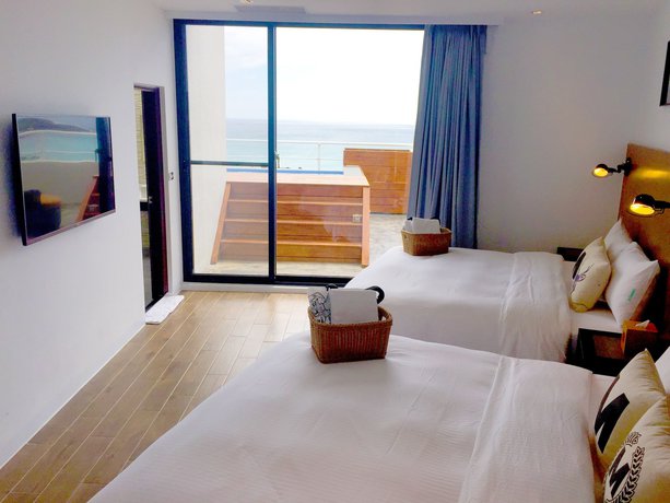 Imagen de la habitación del Hotel Minimi Inn - Sailrock Beach House. Foto 12