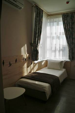 Imagen de la habitación del Hotel Ministerka Lake House. Foto 12