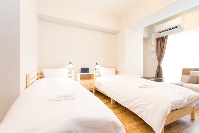 Imagen de la habitación del Hotel Minn Juso. Foto 13