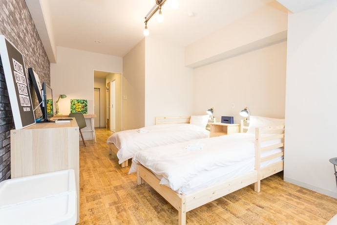 Imagen de la habitación del Hotel Minn Juso. Foto 16