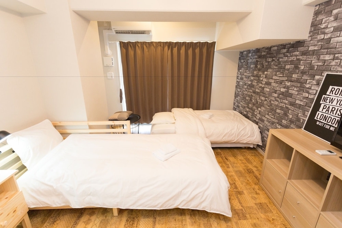 Imagen de la habitación del Hotel Minn Juso. Foto 17