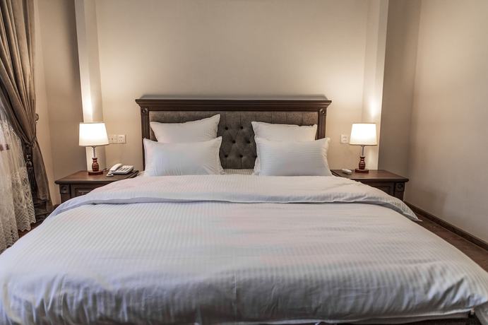 Imagen de la habitación del Hotel Minor, Samarkand. Foto 6