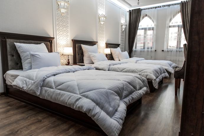 Imagen de la habitación del Hotel Minor, Samarkand. Foto 14