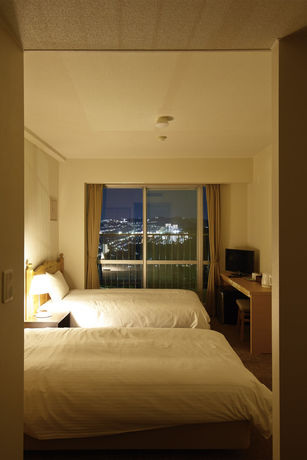 Imagen de la habitación del Hotel Minotani Green Sports. Foto 5