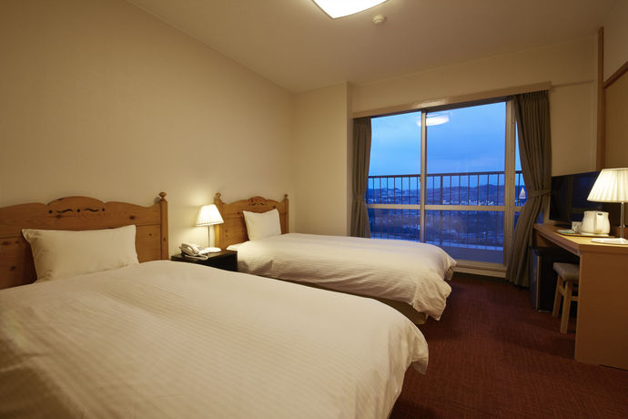 Imagen de la habitación del Hotel Minotani Green Sports. Foto 8