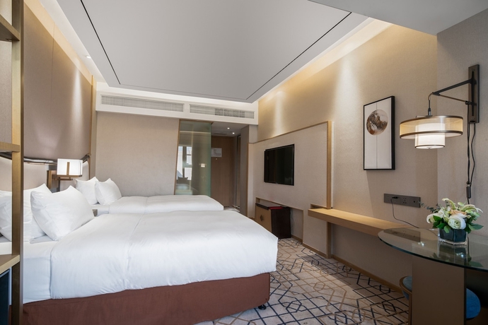 Imagen de la habitación del Hotel Minshan Lhasa Grand. Foto 10