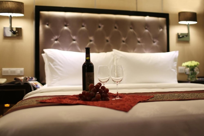 Imagen de la habitación del Hotel Minshan Yuanlin Grand. Foto 5