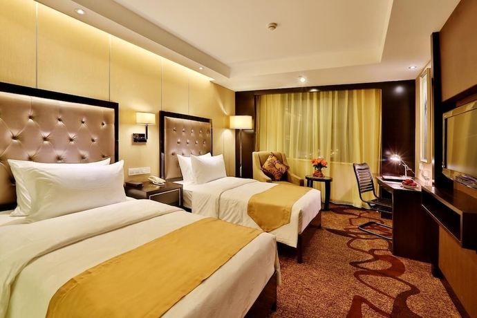 Imagen de la habitación del Hotel Minshan Yuanlin Grand. Foto 8