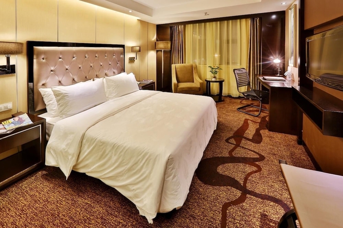 Imagen de la habitación del Hotel Minshan Yuanlin Grand. Foto 9