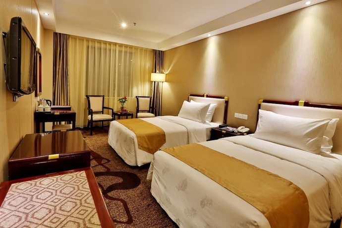 Imagen de la habitación del Hotel Minshan Yuanlin Grand. Foto 10