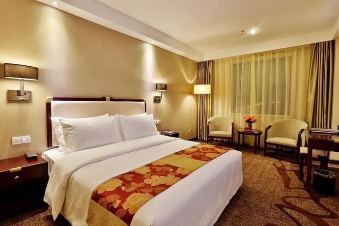 Imagen de la habitación del Hotel Minshan Yuanlin Grand. Foto 11