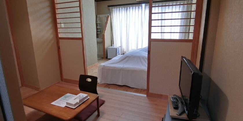 Imagen de la habitación del Hotel Minshuku Inn Shirahama Ekinoyado. Foto 20