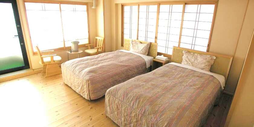 Imagen de la habitación del Hotel Minshuku Inn Shirahama Ekinoyado. Foto 23