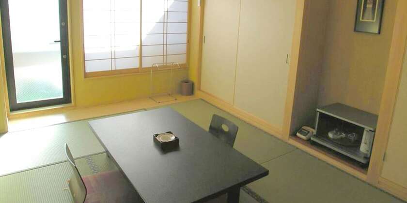 Imagen de la habitación del Hotel Minshuku Inn Shirahama Ekinoyado. Foto 26
