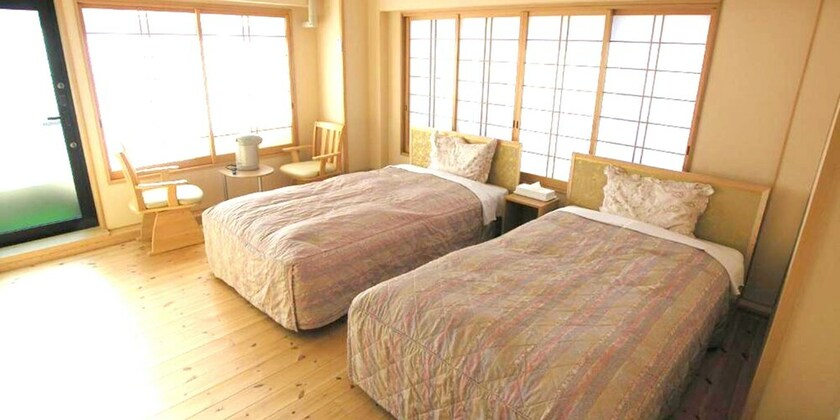 Imagen de la habitación del Hotel Minshuku Inn Shirahama Ekinoyado. Foto 28