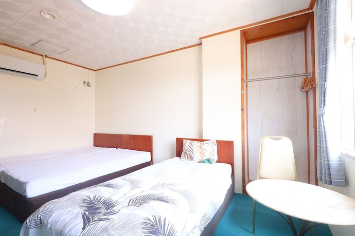 Imagen de la habitación del Hotel Minshuku Seaside House Dugong. Foto 8