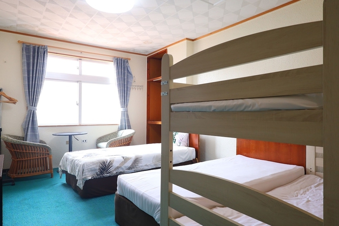 Imagen de la habitación del Hotel Minshuku Seaside House Dugong. Foto 9