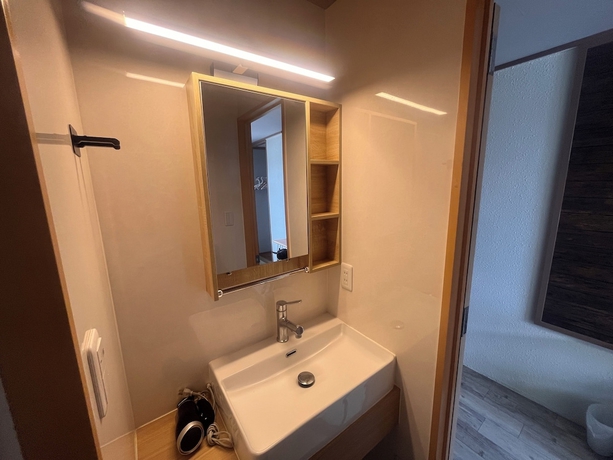 Imagen de la habitación del Hotel Minshuku Seaside House Dugong. Foto 10