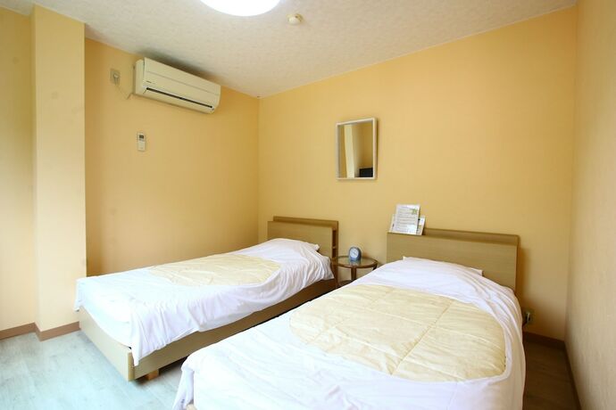 Imagen de la habitación del Hotel Minshuku Takesugi. Foto 11