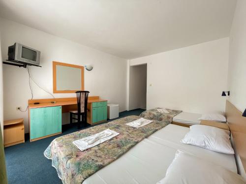 Imagen de la habitación del Hotel Mint Family Hotel. Foto 15