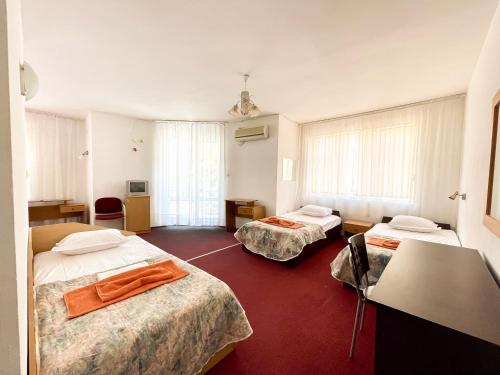 Imagen de la habitación del Hotel Mint Family Hotel. Foto 18